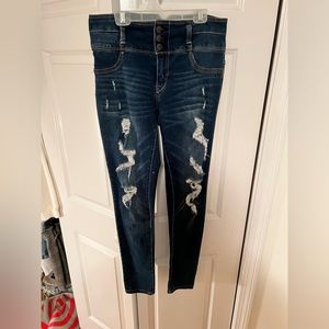 Dark blue skinny jeans with rips